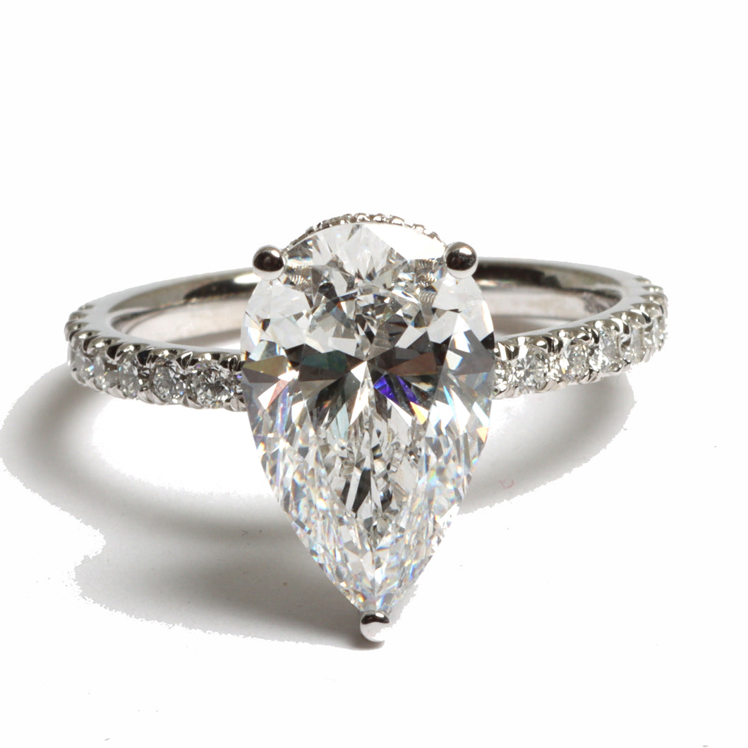 pear cut shape diamond  hidden halo ring